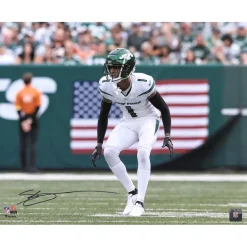 Photos|Prints & Artwork^New York Jets Ahmad Sauce Gardner Autographed 16"x 20" White Jersey Backpedal Photograph